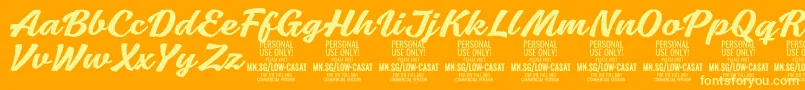 LowcasatmedPersonalUse Font – Yellow Fonts on Orange Background