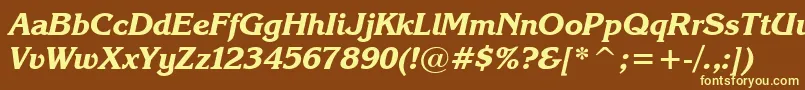 KarinaBlackItalic-fontti – keltaiset fontit ruskealla taustalla
