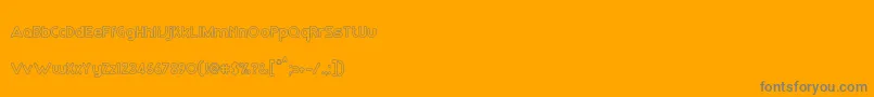 RmPlaytimeMedium-Schriftart – Graue Schriften auf orangefarbenem Hintergrund
