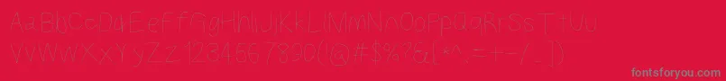 Kabinalt-Schriftart – Graue Schriften auf rotem Hintergrund