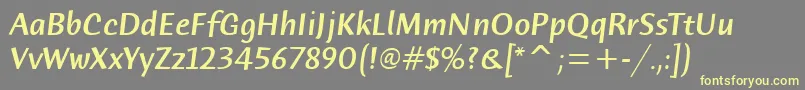 HumanaSansMdItcTtMediumita Font – Yellow Fonts on Gray Background
