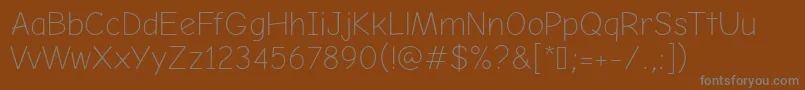 ComicNeueAngularLight Font – Gray Fonts on Brown Background