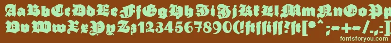 フォントGanzgrobegotisch – 緑色の文字が茶色の背景にあります。