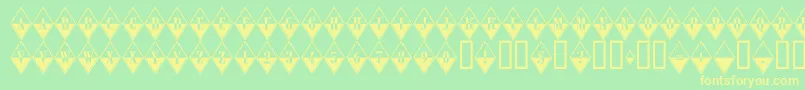 A Rombybwregular Font – Yellow Fonts on Green Background