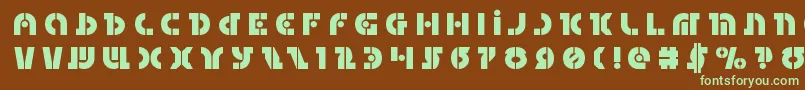 フォントQuestloktitle – 緑色の文字が茶色の背景にあります。