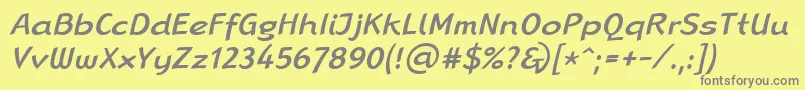 LinotypeRanaMediumItalic-fontti – harmaat kirjasimet keltaisella taustalla