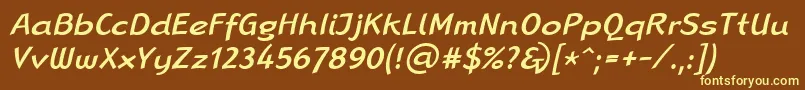 LinotypeRanaMediumItalic-fontti – keltaiset fontit ruskealla taustalla