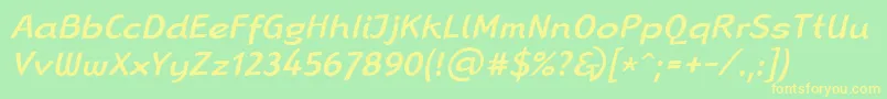 LinotypeRanaMediumItalic-fontti – keltaiset fontit vihreällä taustalla