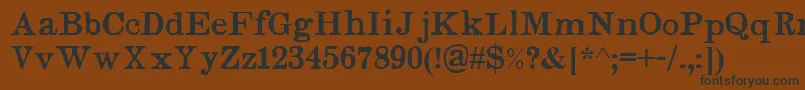 フォントJudges – 黒い文字が茶色の背景にあります