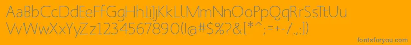 Manksans-fontti – harmaat kirjasimet oranssilla taustalla
