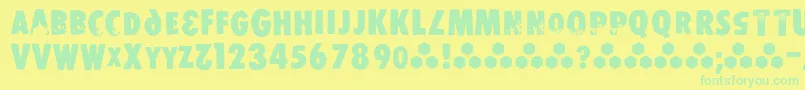 フォントStomper – 黄色い背景に緑の文字