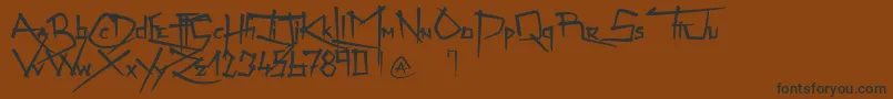 ZenzaiItachi-Schriftart – Schwarze Schriften auf braunem Hintergrund