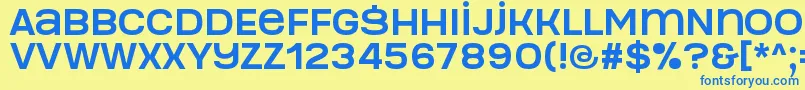 フォントManophiser – 青い文字が黄色の背景にあります。