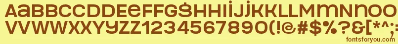 フォントManophiser – 茶色の文字が黄色の背景にあります。