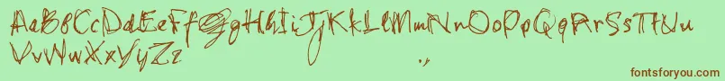 Shstrial-Schriftart – Braune Schriften auf grünem Hintergrund