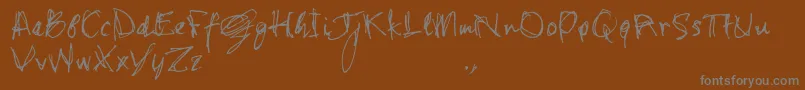 Czcionka Shstrial – szare czcionki na brązowym tle