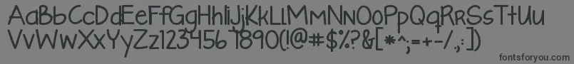 Kglikeaskyscraperbold-Schriftart – Schwarze Schriften auf grauem Hintergrund