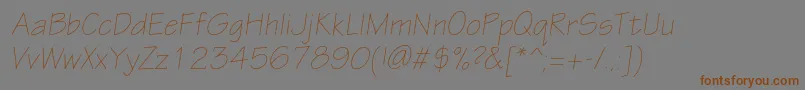EskiztwolightcItalic Font – Brown Fonts on Gray Background