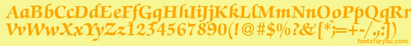 フォントZabriskiescriptHeavyRegular – オレンジの文字が黄色の背景にあります。