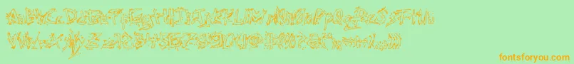 Assassinnationout Font – Orange Fonts on Green Background