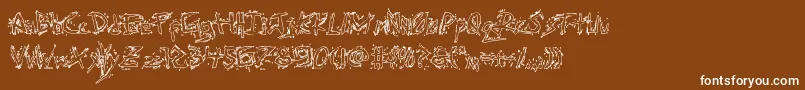 Assassinnationout Font – White Fonts on Brown Background