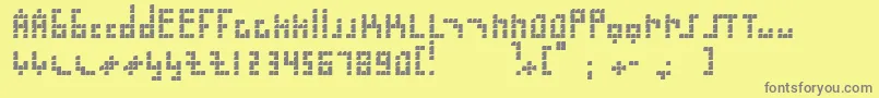 Blokus Font – Gray Fonts on Yellow Background