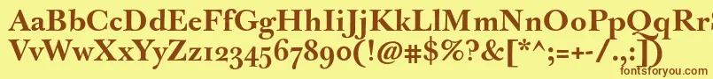フォントJbaskervillemedBold – 茶色の文字が黄色の背景にあります。