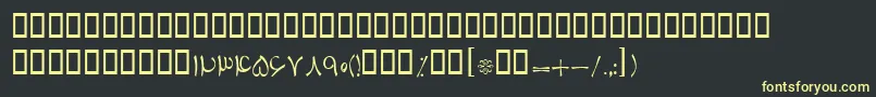 フォントBTabassom – 黒い背景に黄色の文字