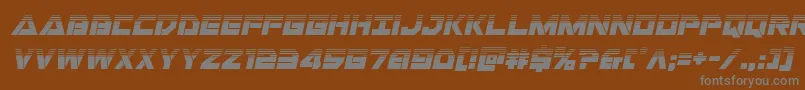 Libertyislandhalfital-fontti – harmaat kirjasimet ruskealla taustalla