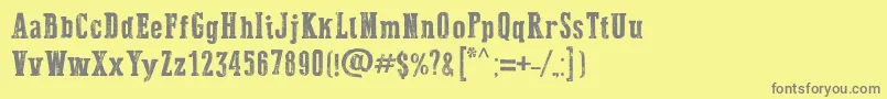 DustWest-fontti – harmaat kirjasimet keltaisella taustalla