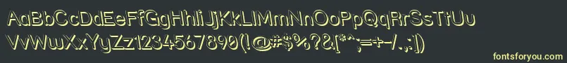 Strshdri Font – Yellow Fonts on Black Background