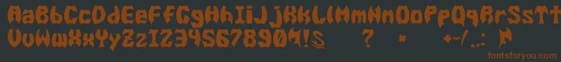 Шрифт GomariceBatMen – коричневые шрифты на чёрном фоне