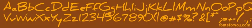 フォントDanielbd – オレンジ色の文字が茶色の背景にあります。