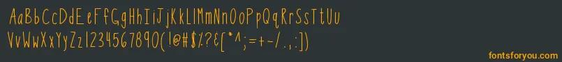 Czcionka Kbsothinteresting – pomarańczowe czcionki na czarnym tle
