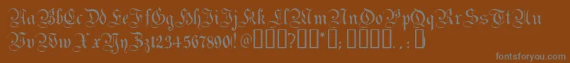 Magdeburg-Schriftart – Graue Schriften auf braunem Hintergrund