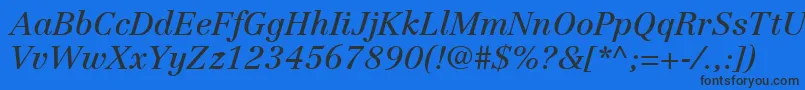 Czcionka LinotypeCentennialLt56Italic – czarne czcionki na niebieskim tle