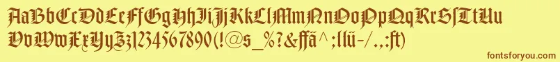 NotreDameLtRomanDfr-Schriftart – Braune Schriften auf gelbem Hintergrund