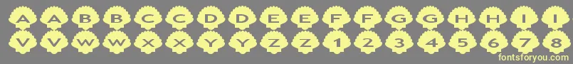 Asshells Font – Yellow Fonts on Gray Background