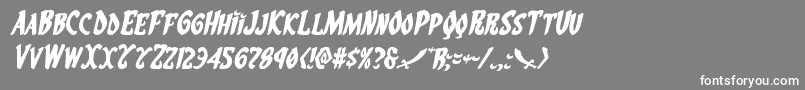 フォントEskindarexpandital – 灰色の背景に白い文字