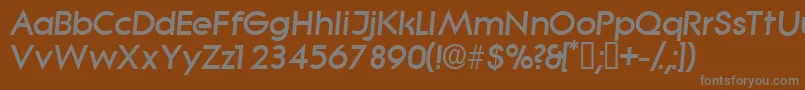 SabordisplaysskItalic-fontti – harmaat kirjasimet ruskealla taustalla