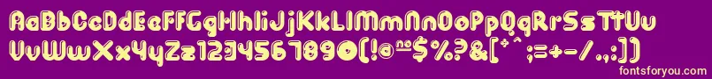 SpitShine Font – Yellow Fonts on Purple Background