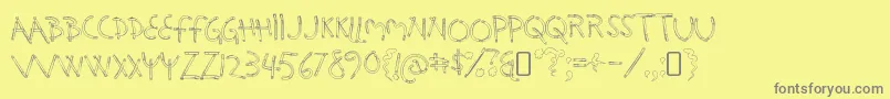 フォントHolysmokesRegular – 黄色の背景に灰色の文字