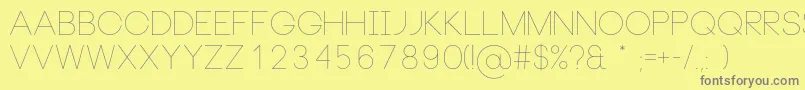 フォントNeouThin – 黄色の背景に灰色の文字