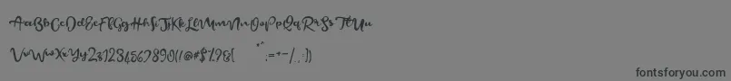 BeautifyScript-Schriftart – Schwarze Schriften auf grauem Hintergrund