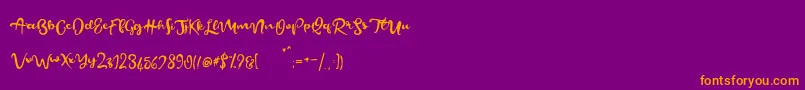 フォントBeautifyScript – 紫色の背景にオレンジのフォント