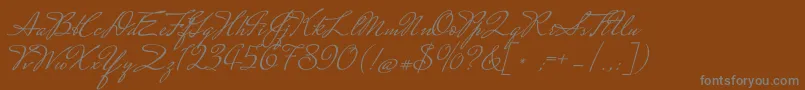 MrsSaintDelafield Font – Gray Fonts on Brown Background