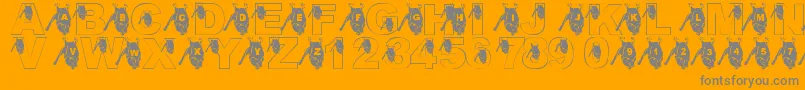 LmsGoingBatty-Schriftart – Graue Schriften auf orangefarbenem Hintergrund