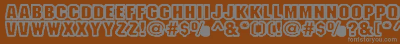 Fonte Fanao – fontes cinzas em um fundo marrom