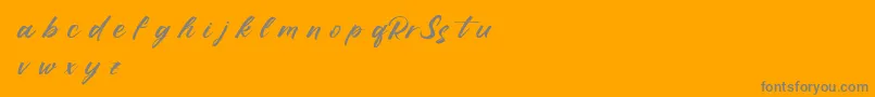 RufflescriptDemo-Schriftart – Graue Schriften auf orangefarbenem Hintergrund