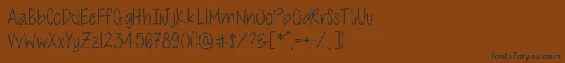 CutiePatootieSkinny Font – Black Fonts on Brown Background